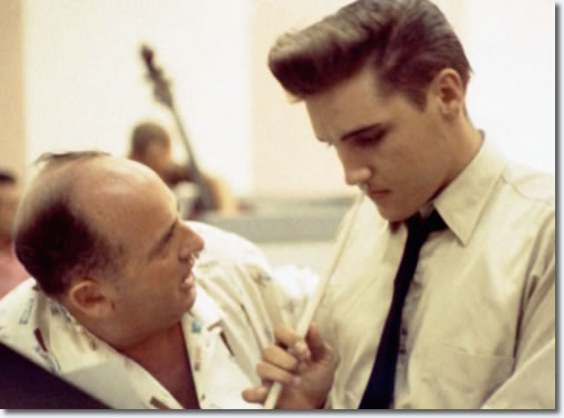 Colonel Tom Parker talks with Elvis Presley at the June 10 1958 Recording Session.
