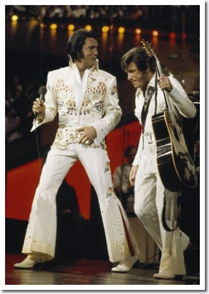 January 14, 1973 : 'Aloha from Hawaii' : Elvis Presley and Charlie Hodge.