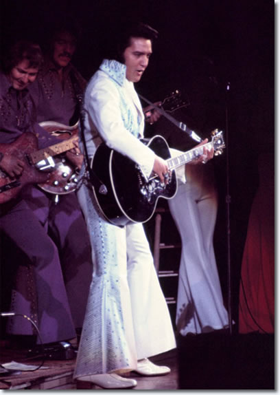 This photo is from June 28, 1974. Elvis is wearing the rare Aqua Blue Phoenix jumpsuit. 