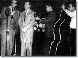 Elvis and Tommy Edwards at Brooklyn High School on October 20, 195