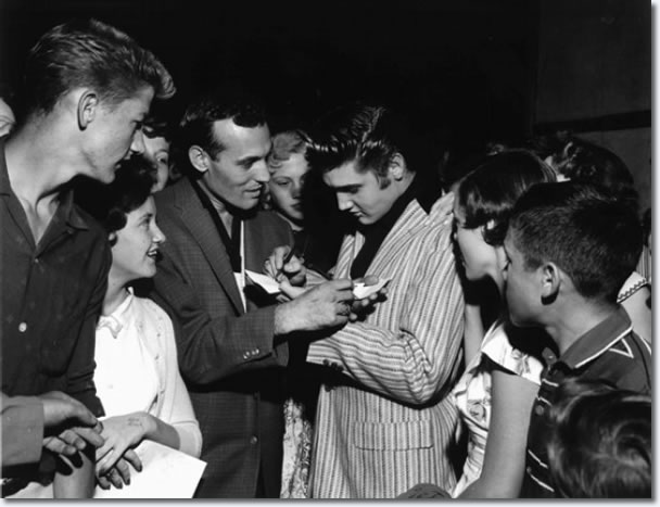 Carl Perkins and Elvis Presley swap autographs, Memphis
