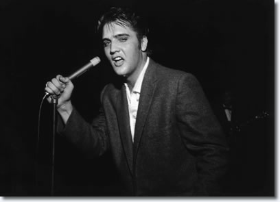 More than 7,000 people jammed Ellis Auditorium on the night of May 15, 1956, to stomp, shudder, shriek and sigh as a young Elvis Presley writhed his way through a rock and roll repertoire. Presley was the blockbuster of Bob Neal's Cotton Picking Jamboree, a feature of Cotton Carnival opening night.