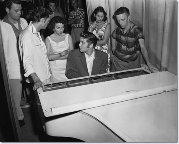 Elvis Presley back stage at the piano : Jacksonville, August, 1956.