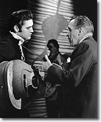 Elvis Presley talks with Ed Sullivan