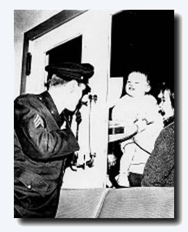 Elvis chats to young fans through one of the terminal doors